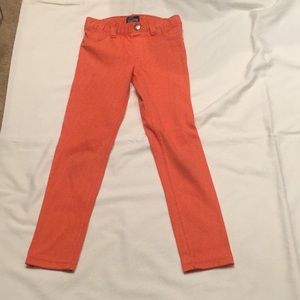 Orange denim jeans
